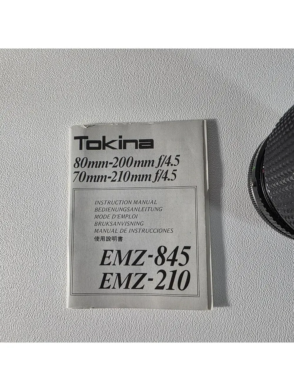 Tokina RMC EMZ 70-210mm f/4.5 Manual Zoom Telephoto Lens W/Caps & Manual